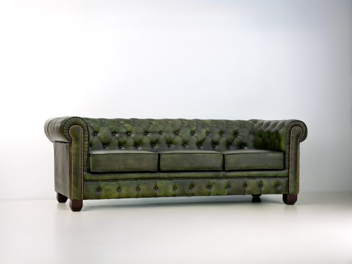 Canapé Chesterfield 3 places vert vu de trois quarts