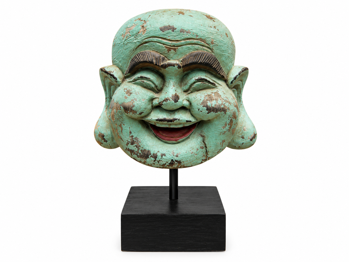 Tête de Bouddha rieur au fini vert-de-gris usé, bouche ouverte, sur socle noir