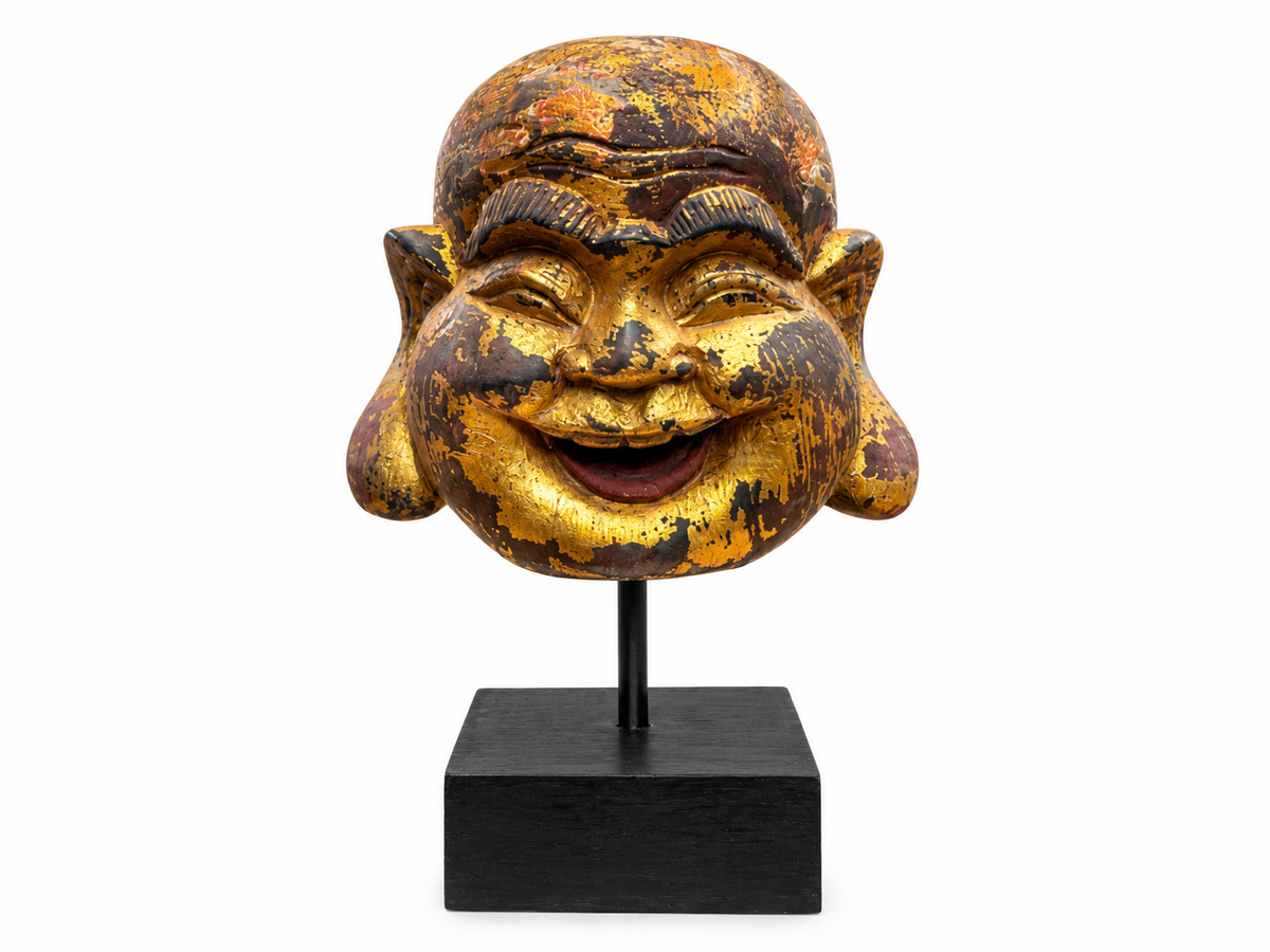 Tête de Bouddha rieur dorée à la feuille sur fond bronze, montée sur socle noir