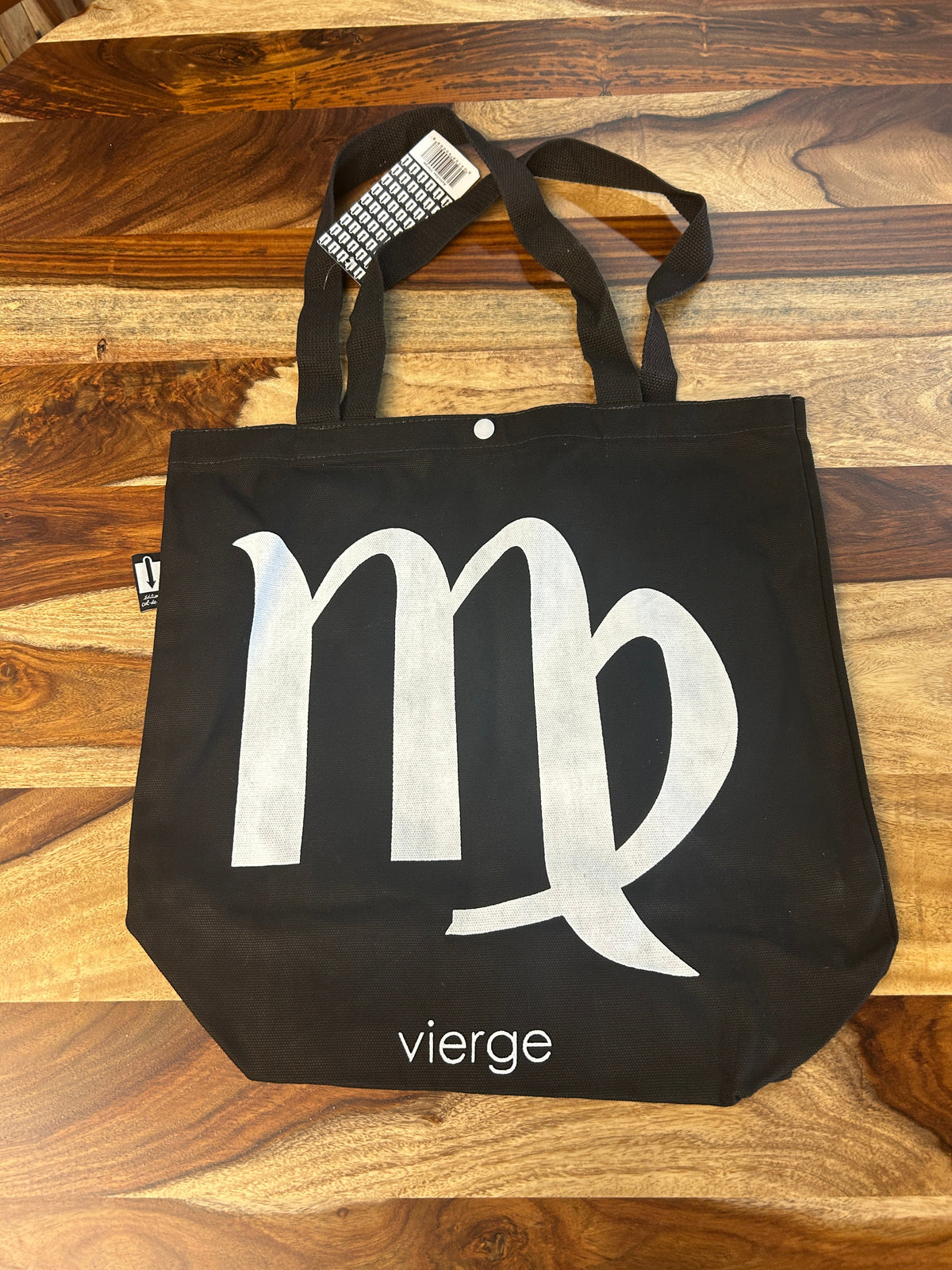 Tote bag noir au symbole de la Vierge imprimé en blanc