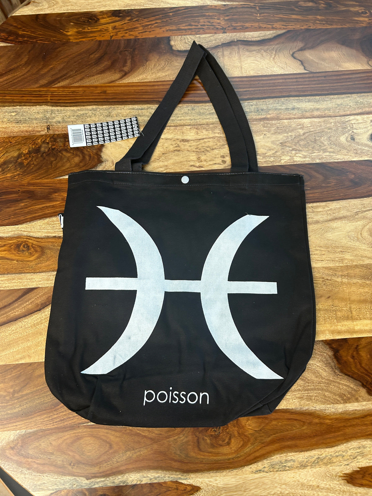Tote bag noir au symbole des Poissons imprimé en blanc