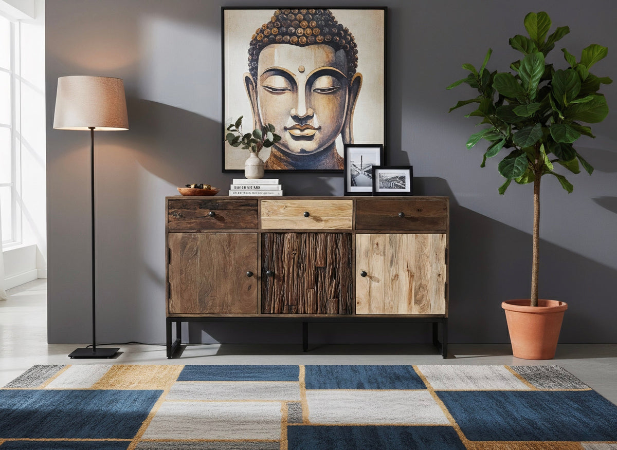 Buffet Taiga en manguier sur pattes en métal noir, sous un tableau de Bouddha dans un salon